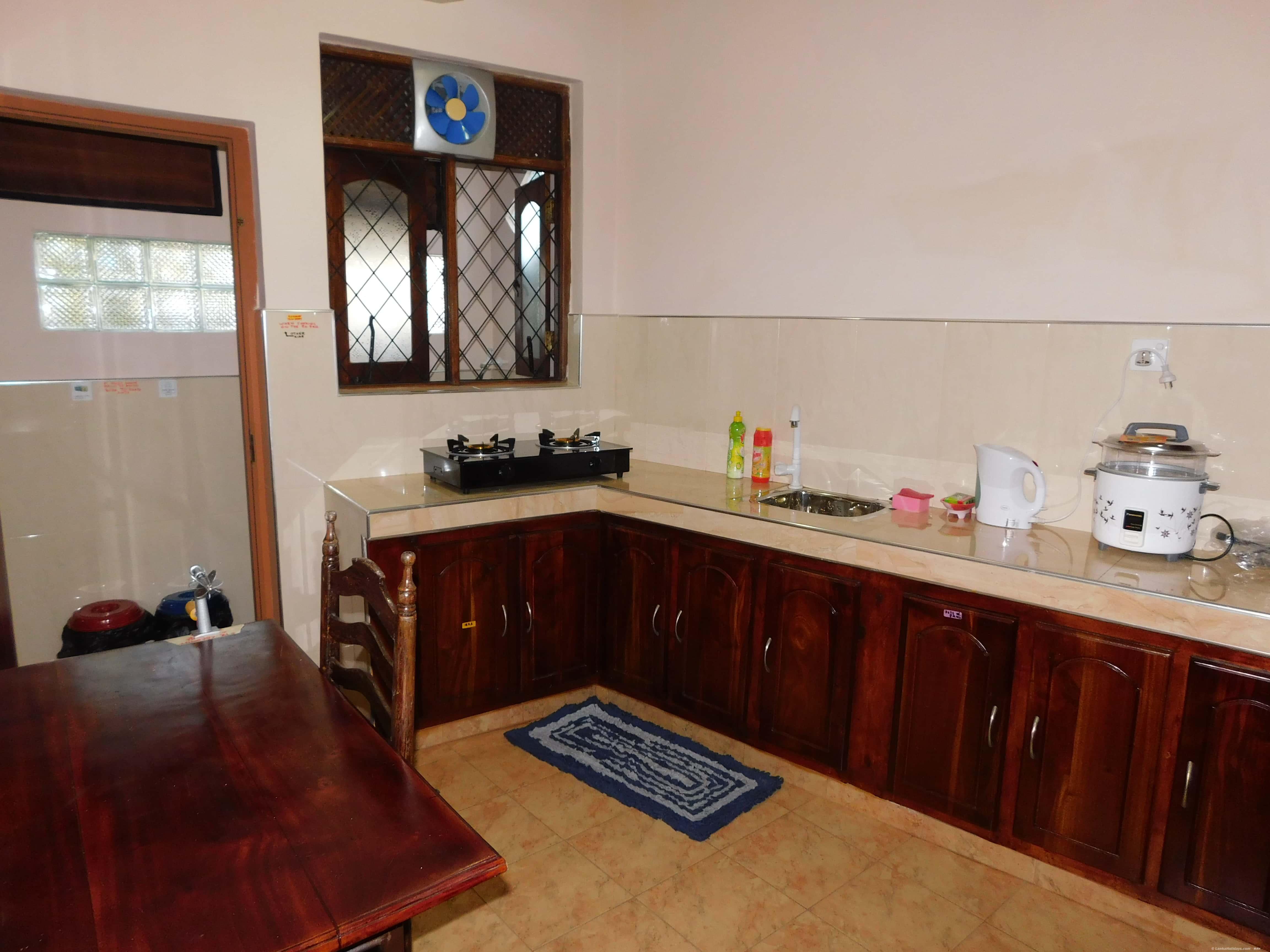 KITCHEN WITH GAS COOKER , RICE COOKER  H